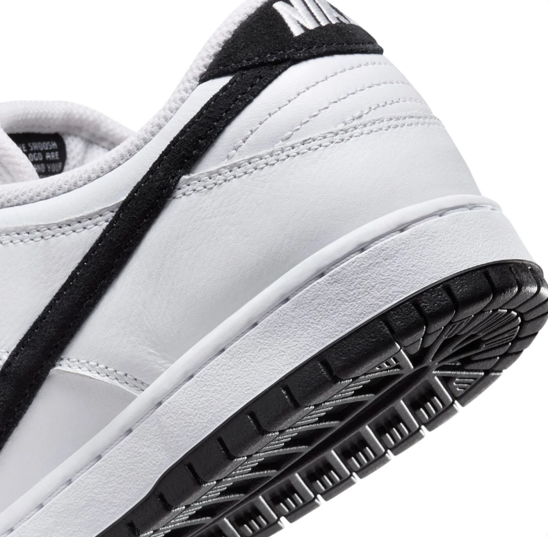 Nike SB Dunk Low Pro White Sneakers with Black Swoosh & Outsole