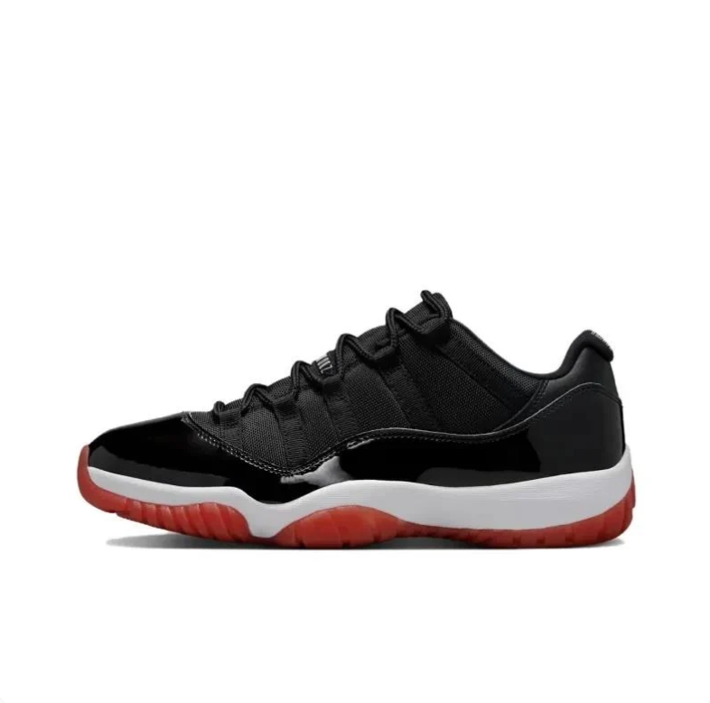 Air Jordan 11 Low Black Sneakers with White Midsole & Red Outsole