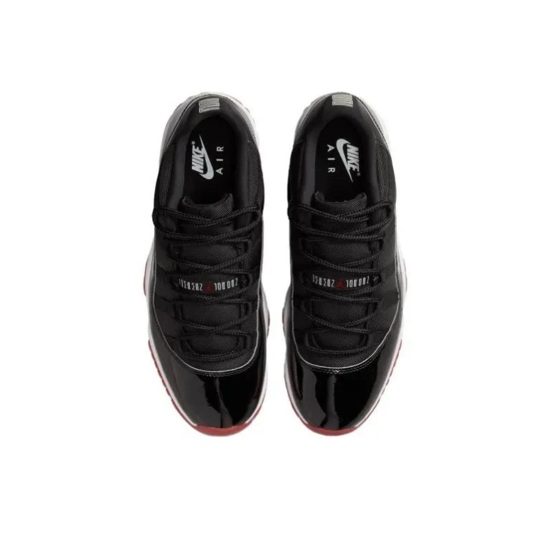 Air Jordan 11 Low Black Sneakers with White Midsole & Red Outsole