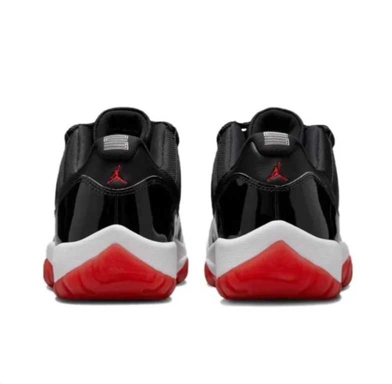 Air Jordan 11 Low Black Sneakers with White Midsole & Red Outsole