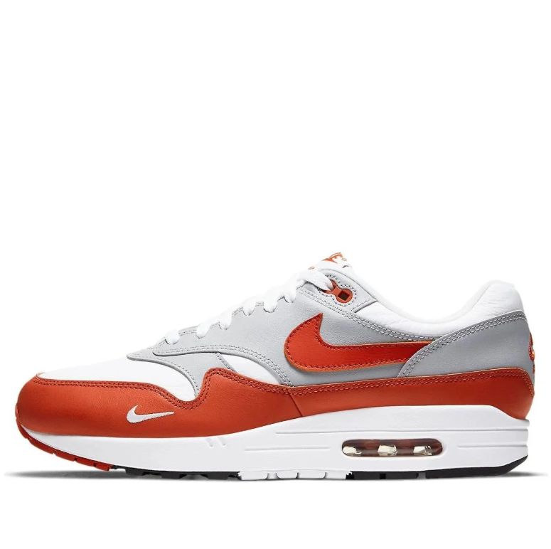 Nike Air Max 1 White & Light Gray Sneakers with Burnt Orange Accents