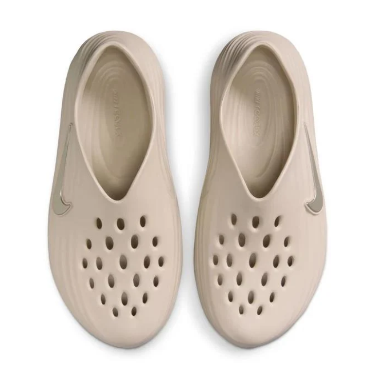 Nike Beige Perforated Slip-On Shoes with Sculpted Wave Design
