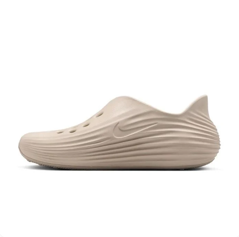 Nike Beige Perforated Slip-On Shoes with Sculpted Wave Design