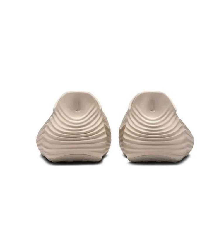 Nike Beige Perforated Slip-On Shoes with Sculpted Wave Design